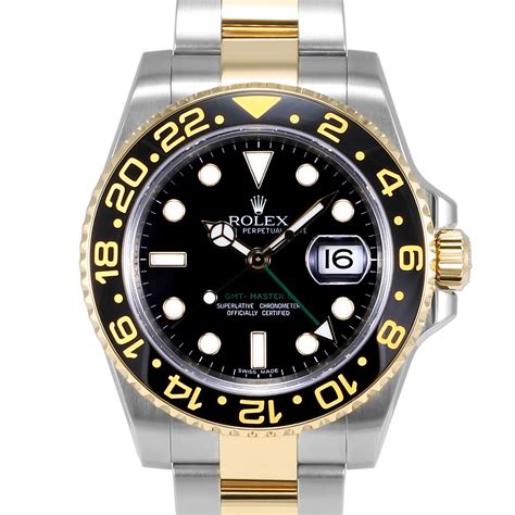 rolex gmt gold black dial